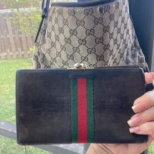 Suede Gucci wallet inside in great condition outside Has normal wear great piece